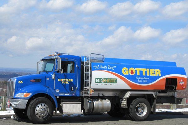 Gottier Fuel Bioheat delivery truck with blue tank and orange lettering